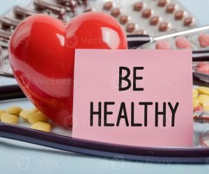 be-healthy-advice-on-pink-sticky-note-near-stethoscope-and-tablets-photo